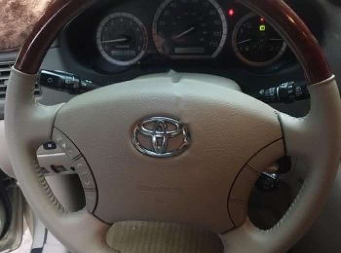 Bán Toyota Sienna XLE 3.5 vàng cát 2004 mua mới đập thùng