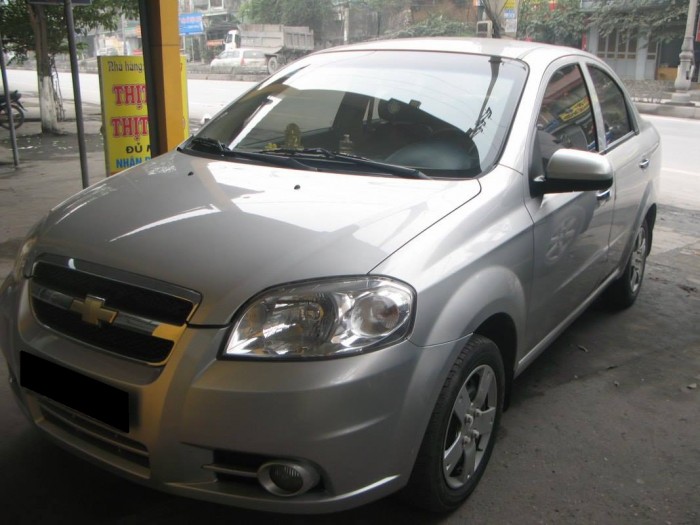Bán chiếc Chevrolet Aveo 2011 mt màu bạc zin nguyên không lỗi lầm