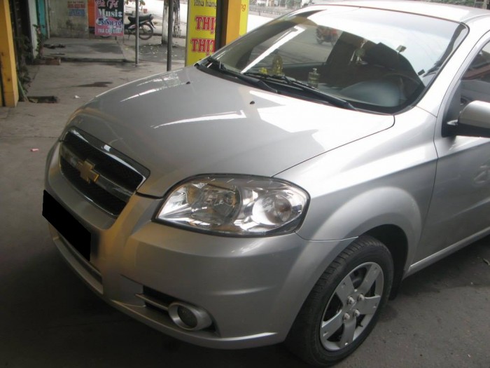 Bán chiếc Chevrolet Aveo 2011 mt màu bạc zin nguyên không lỗi lầm