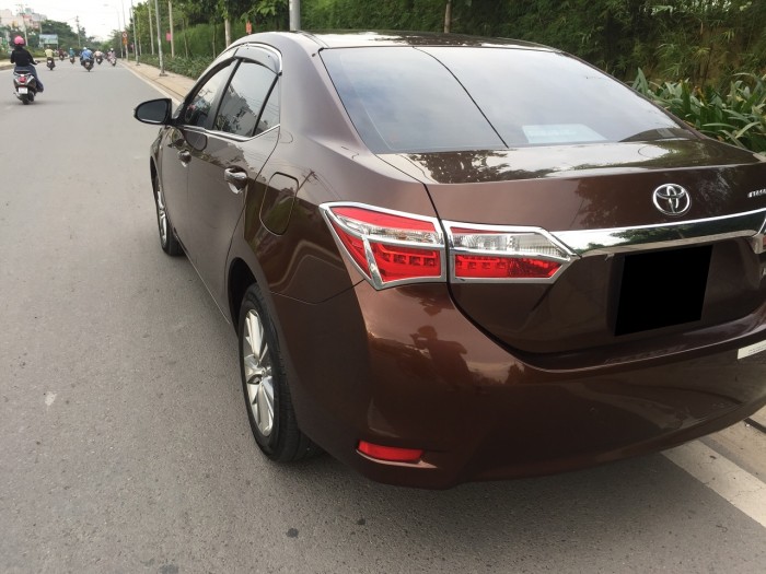 Bán xe Toyota Altis 2015 phiên bản 1.8at màu nâu