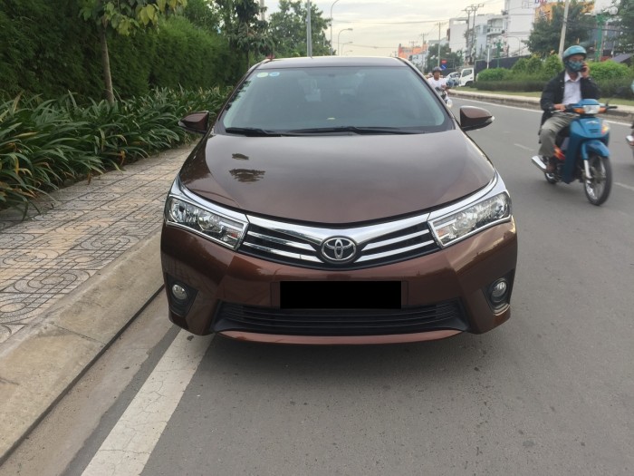 Bán xe Toyota Altis 2015 phiên bản 1.8at màu nâu