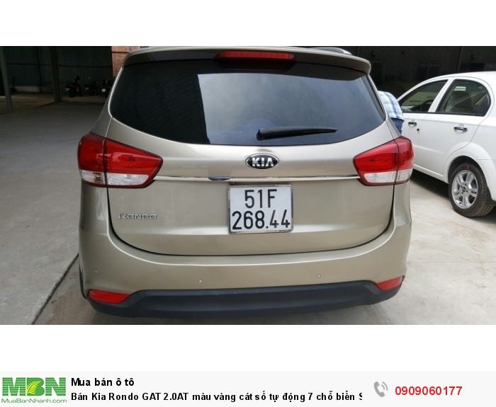 Bán Kia Rondo GAT 2.0AT màu vàng cát số tự động 7 chỗ biển Sài Gòn