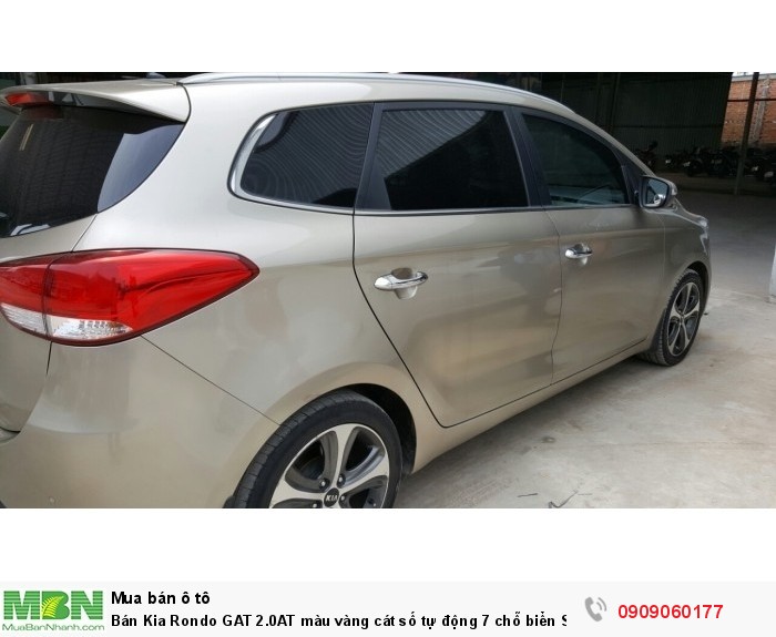 Bán Kia Rondo GAT 2.0AT màu vàng cát số tự động 7 chỗ biển Sài Gòn