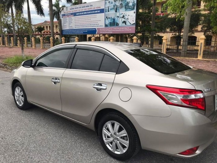 Bán xe Toyota Vios E 2016mt màu vàng hoàng kim zin cực chất