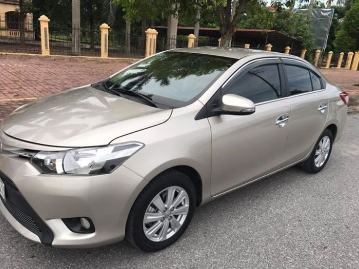 Bán xe Toyota Vios E 2016mt màu vàng hoàng kim zin cực chất