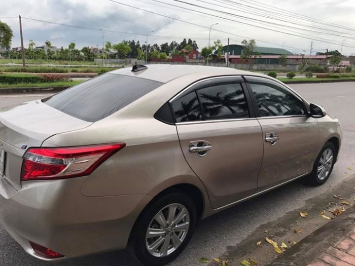 Bán xe Toyota Vios E 2016mt màu vàng hoàng kim zin cực chất
