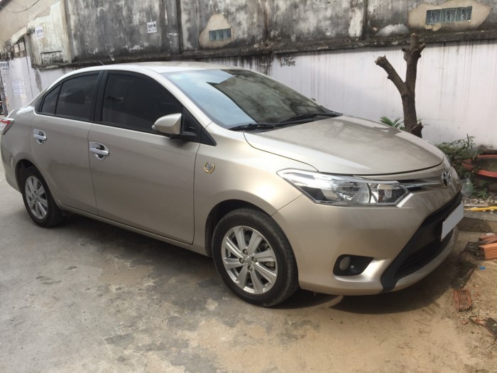 Bán xe Toyota Vios E mt 2017 màu vàng kim