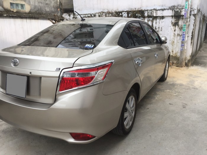 Bán xe Toyota Vios E mt 2017 màu vàng kim