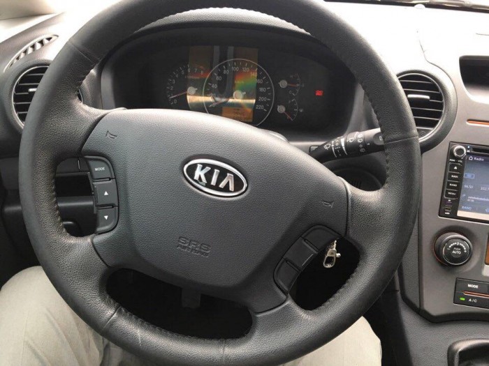 Bán chiếc Kia Carens 2015 màu vàng cát số sàn