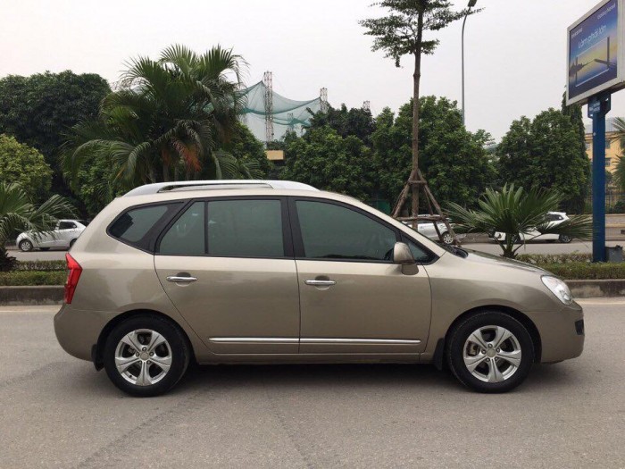 Bán chiếc Kia Carens 2015 màu vàng cát số sàn