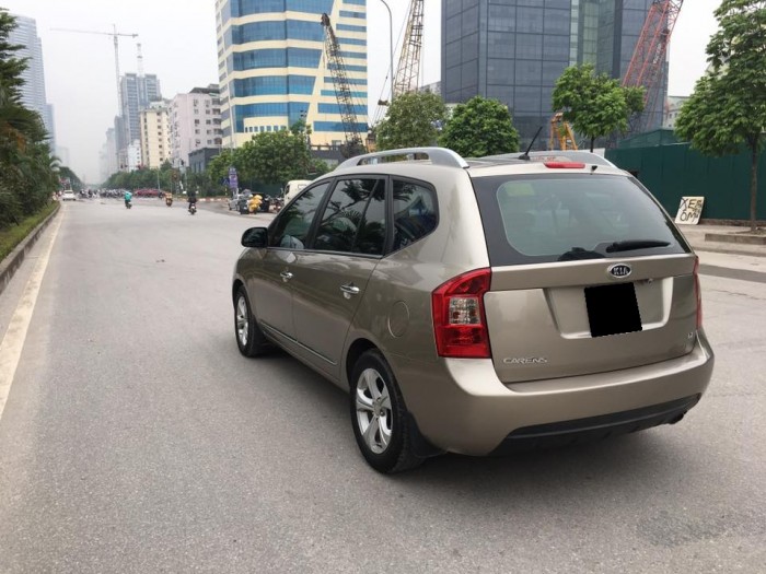 Bán chiếc Kia Carens 2015 màu vàng cát số sàn