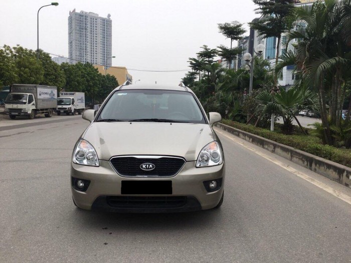 Bán chiếc Kia Carens 2015 màu vàng cát số sàn