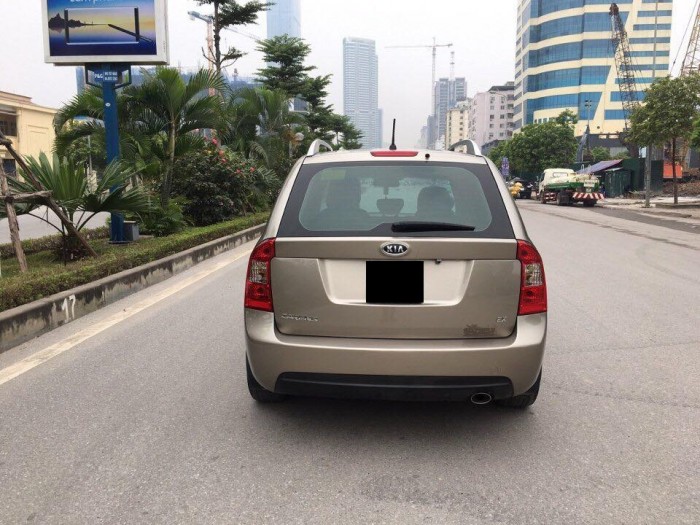 Bán chiếc Kia Carens 2015 màu vàng cát số sàn