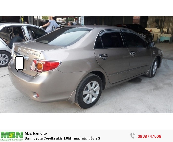 Bán Toyota  Corolla altis 1,8MT màu nâu gốc SG