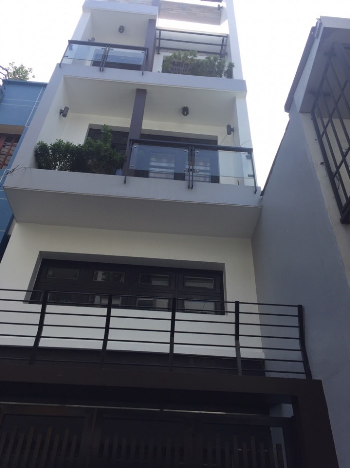 Cho thuê nhà 3 lầu trong hẻm 3m đường Duy Tân, phường 15, quận Phú Nhuận.