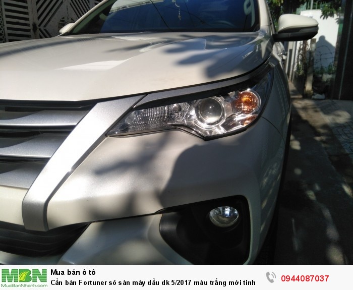 Cần bán Fortuner sô sàn máy dầu dk 5/2017 màu trắng mới tinh như hãng