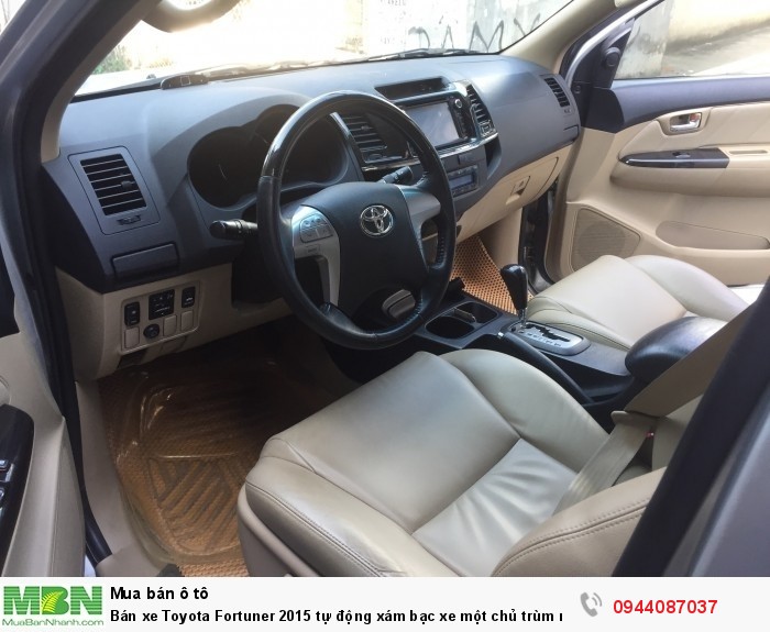 Bán xe Toyota Fortuner 2015 tự động xám bạc xe một chủ trùm mền