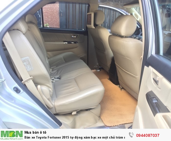 Bán xe Toyota Fortuner 2015 tự động xám bạc xe một chủ trùm mền