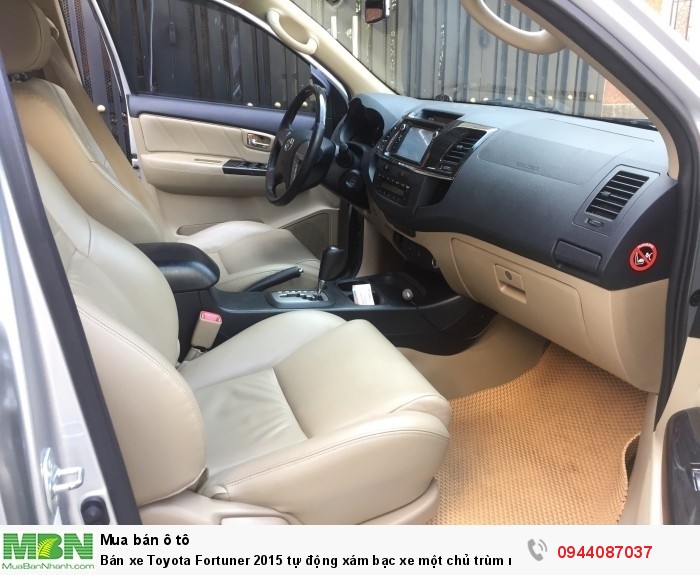 Bán xe Toyota Fortuner 2015 tự động xám bạc xe một chủ trùm mền