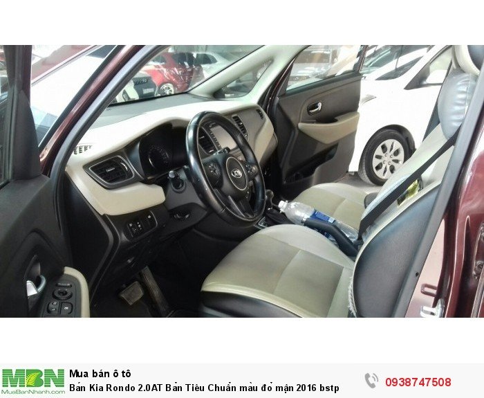 Bán Kia Rondo 2.0AT Bản Tiêu Chuẩn màu đỏ mận 2016 bstp
