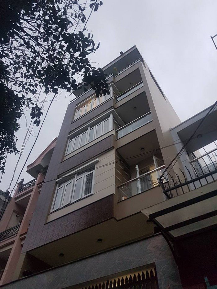 Nhà phố Nguyễn Phúc Chu(5x12m),4 tầng, nở hậu,hẻm 8m,ôtô trong nhà.