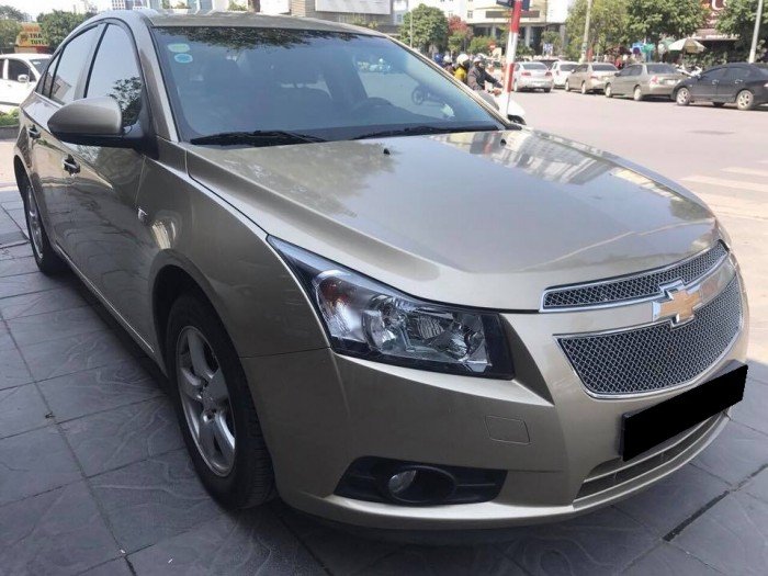 Cần bán xe Chevrolet Cruze LTZ 1.8at 2014 màu vàng kim zin