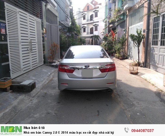 Nhà em bán Camry 2.0 E 2014 màu bạc xe rất đẹp nhà xài kỹ