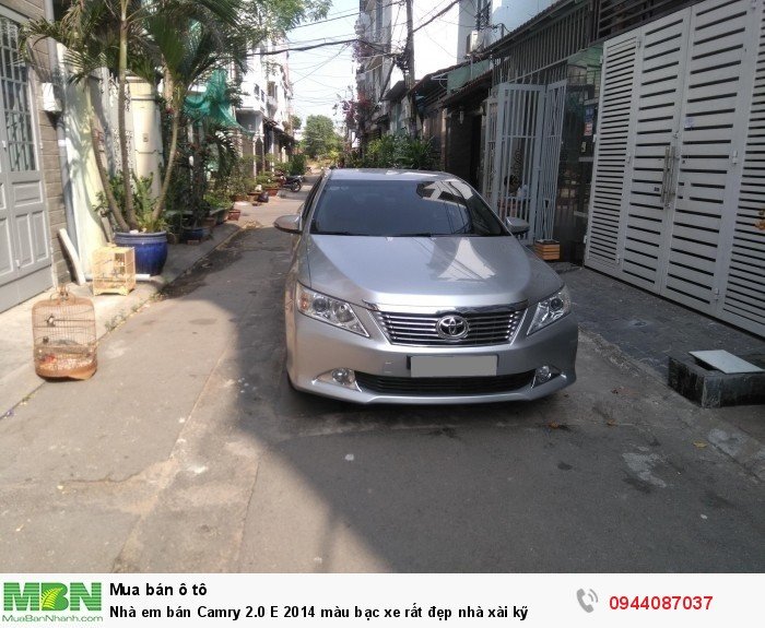 Nhà em bán Camry 2.0 E 2014 màu bạc xe rất đẹp nhà xài kỹ