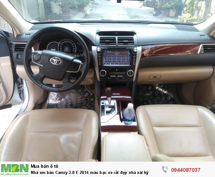 Nhà em bán Camry 2.0 E 2014 màu bạc xe rất đẹp nhà xài kỹ