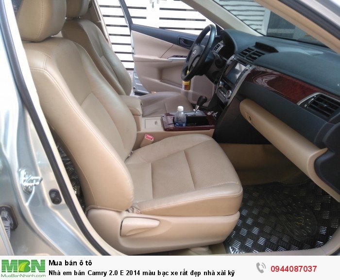 Nhà em bán Camry 2.0 E 2014 màu bạc xe rất đẹp nhà xài kỹ