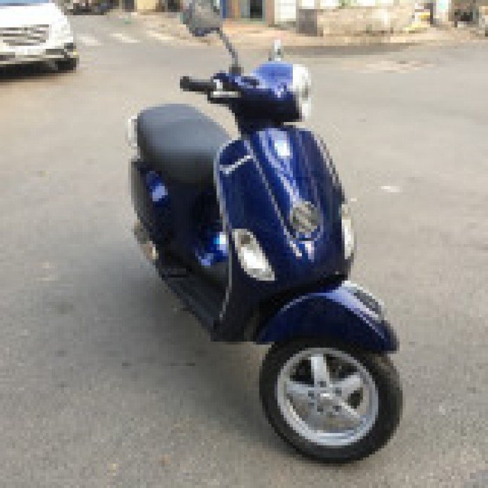 Vespa LX ie mua 2013 mẫu Scooter cổ điển,mới 99%