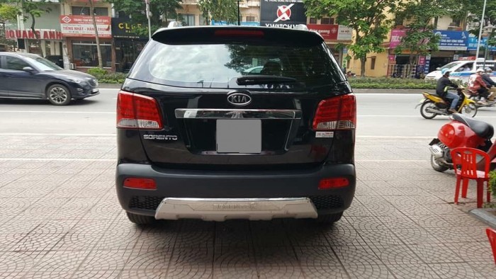 Bán Kia Sorento 2014 số sàn màu đen xe gia đình một chủ đi từ đầu.