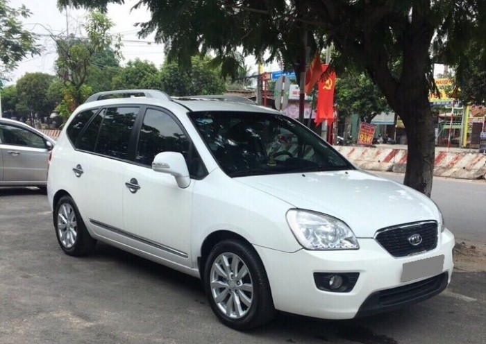 Cần bán gấp Kia Carens 2.0 tự động 2014 màu trắng xe gia đình giữ kỹ