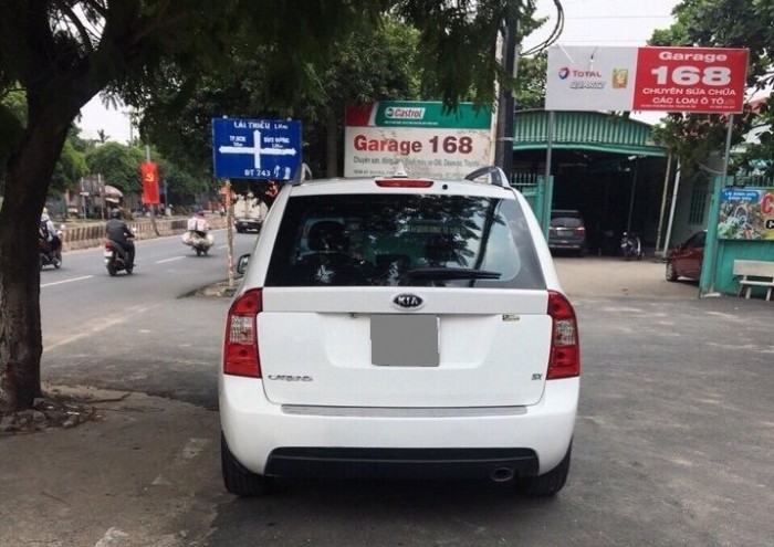 Cần bán gấp Kia Carens 2.0 tự động 2014 màu trắng xe gia đình giữ kỹ