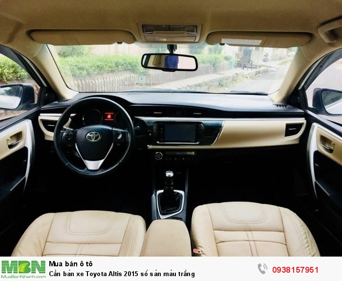 Cần bán xe Toyota Altis 2015 số sàn màu trắng