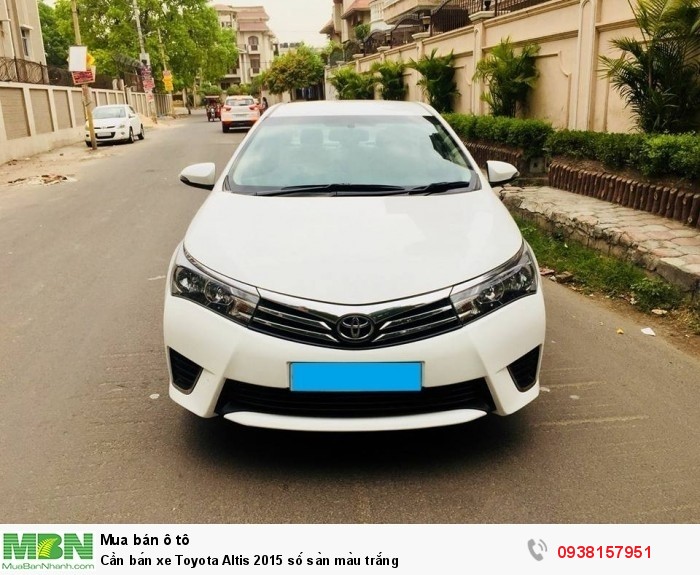 Cần bán xe Toyota Altis 2015 số sàn màu trắng
