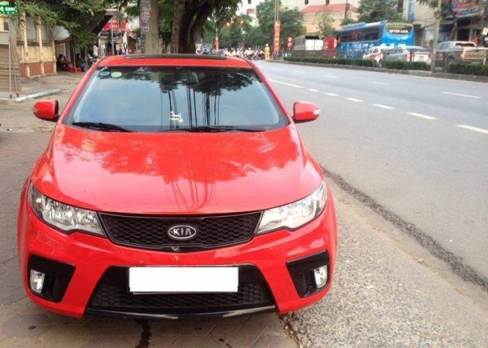 Mình cần bán gấp Kia Cerato  hai cữa thể thao sx 2010 đỏ cực đẹp