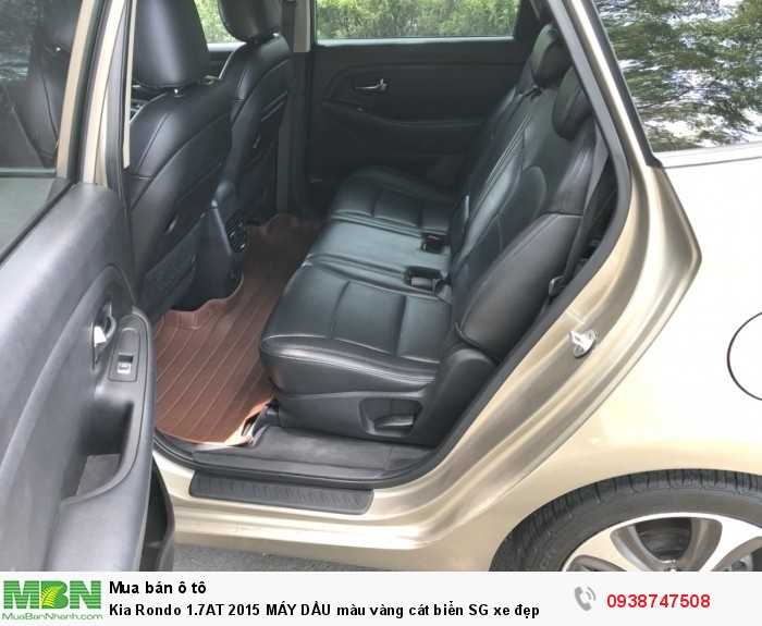 Kia Rondo 1.7AT 2015 MÁY DẦU màu vàng cát biển SG xe đẹp