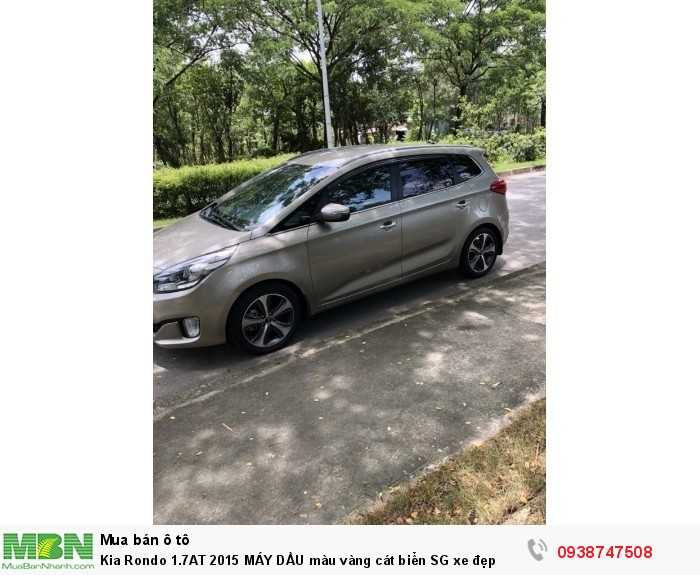 Kia Rondo 1.7AT 2015 MÁY DẦU màu vàng cát biển SG xe đẹp
