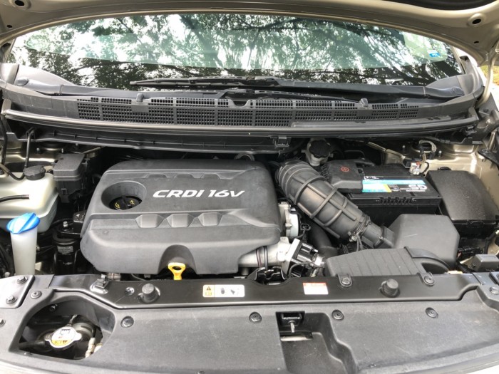 Kia Rondo 1.7AT 2015 MÁY DẦU màu vàng cát biển SG xe đẹp
