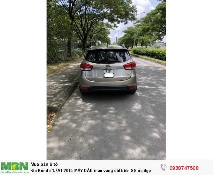 Kia Rondo 1.7AT 2015 MÁY DẦU màu vàng cát biển SG xe đẹp