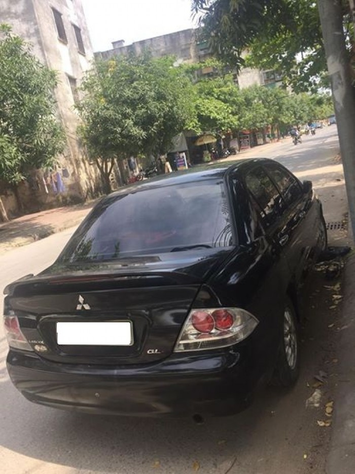 Khách coi Mitsubishi Lacer 1.8 at 2003 màu đen