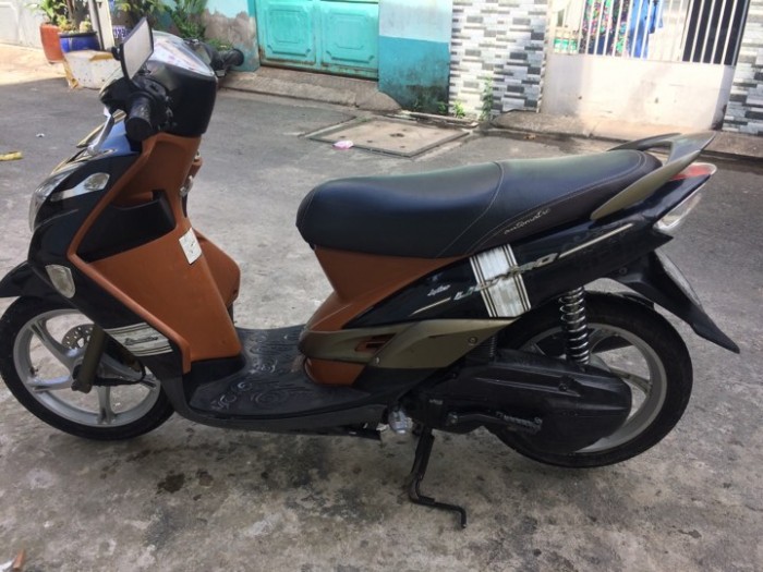 Xe Mio Ultimo màu nâu đen dáng nhỏ xinh tiết kiệm nhiên liệu