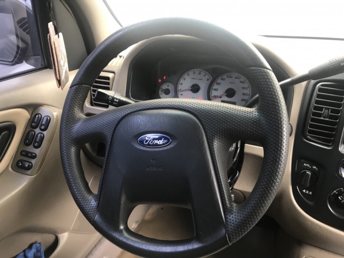 Bán em Ford Escape XLT 2003 màu vàng cát đẹp leng keng