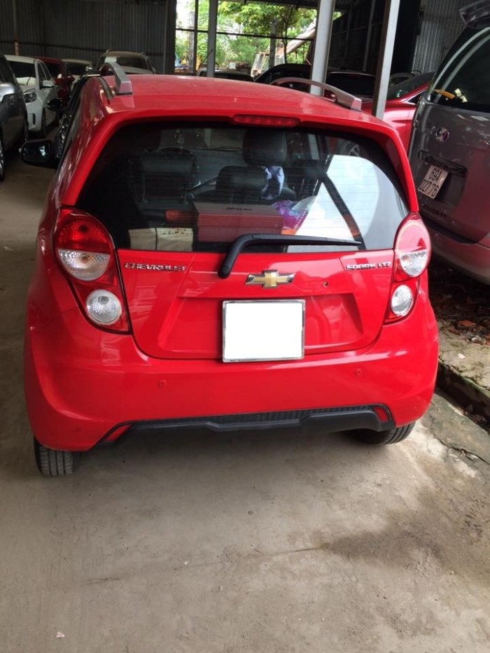 Kẹt tiền bán em Chevrolet Spark 2015 số tự động màu đỏ
