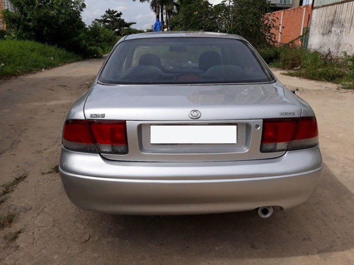 Cần bán xe Mazda 626 đăng ký 12/1996, số tự động, màu bạc