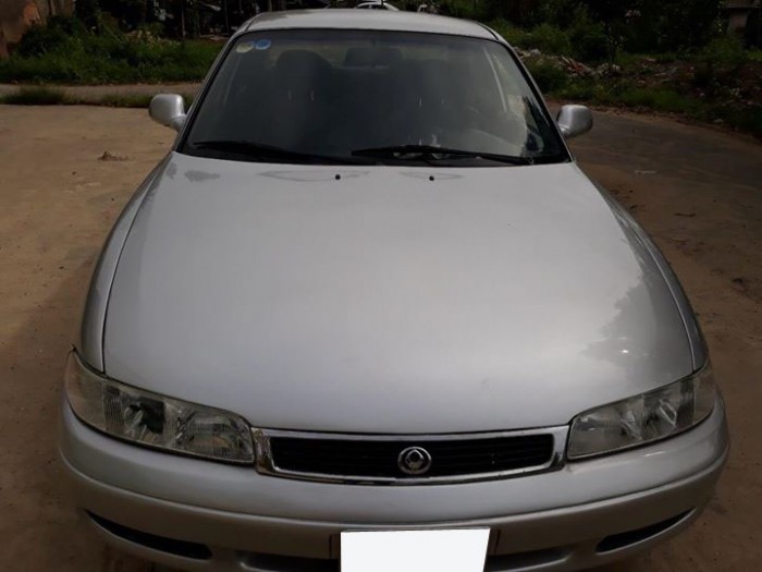 Cần bán xe Mazda 626 đăng ký 12/1996, số tự động, màu bạc