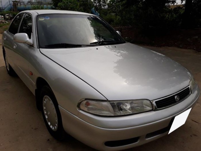 Cần bán xe Mazda 626 đăng ký 12/1996, số tự động, màu bạc