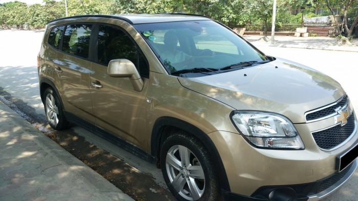 Cần bán gấp xe Chevrolet Orlando đời 2012 bản LTZ,số tự động,màu vàng cát