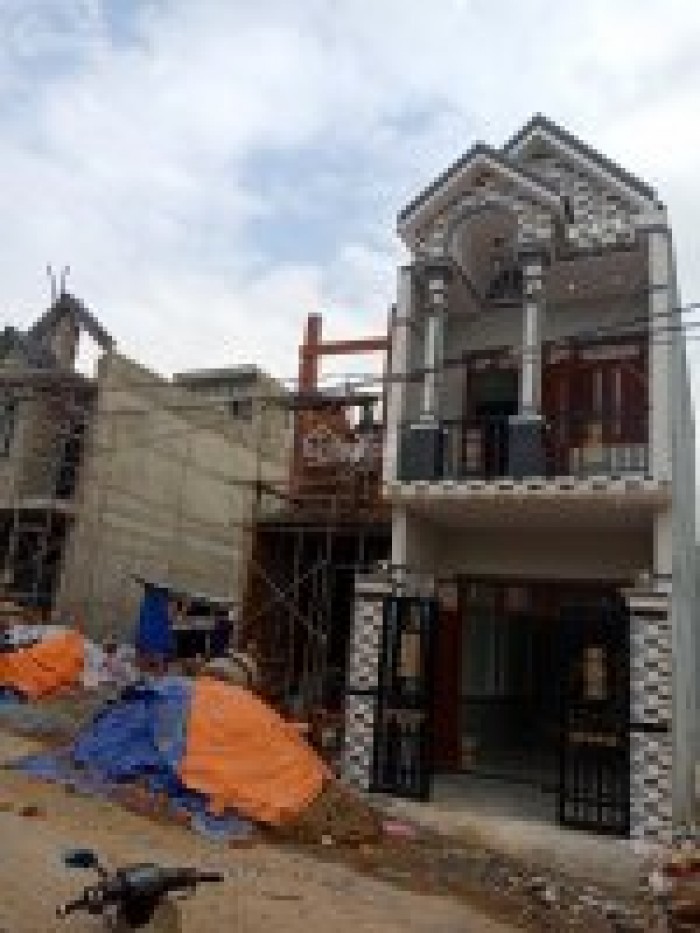 Cần bán nhà mới xây 1 trệt, 1 lầu 70m2 Tân Bình, Dĩ An